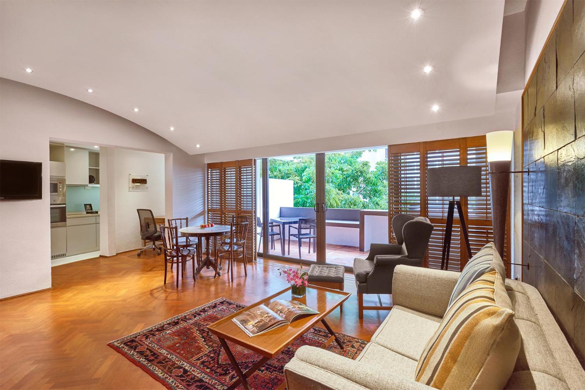 Goodwood Park Hotel Singapura Quarto foto A typical apartment interior
